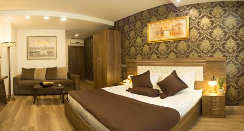 Imagen de la habitación del A Palace Suites. Foto 3