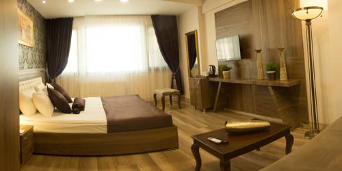 Imagen de la habitación del A Palace Suites. Foto 4