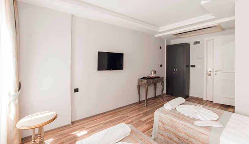 Imagen de la habitación del A Plus Residence. Foto 8