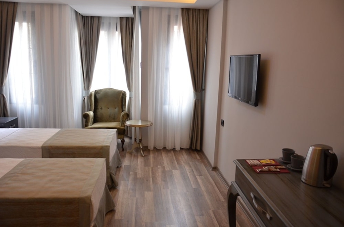 Imagen de la habitación del A Plus Residence. Foto 10