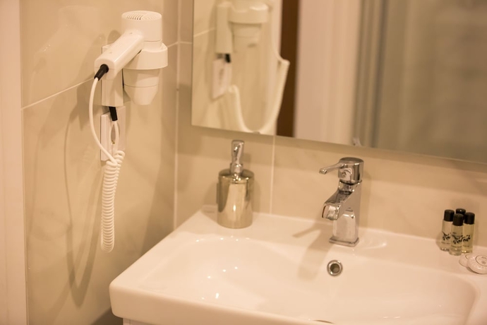 Imagen de la habitación del A Royal Suit Hotel. Foto 12