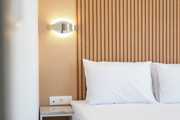 Imagen de la habitación del AIRSCAPE HOTEL FREE SHUTTLE ATH AIRPORT. Foto 5