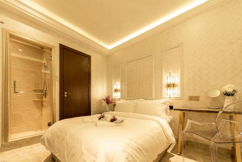 Imagen de la habitación del AJ Residence - Above Peppermint Asia City. Foto 16