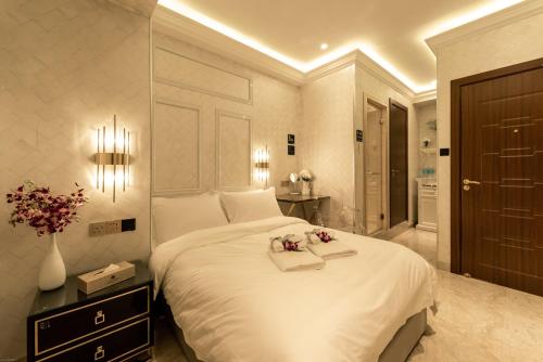 Imagen de la habitación del AJ Residence - Above Peppermint Asia City. Foto 18