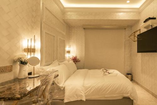Imagen de la habitación del AJ Residence - Above Peppermint Asia City. Foto 19