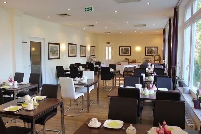 Imagen del bar/restaurante del AKZENT Strandresidenz Villa Verdi. Foto 2