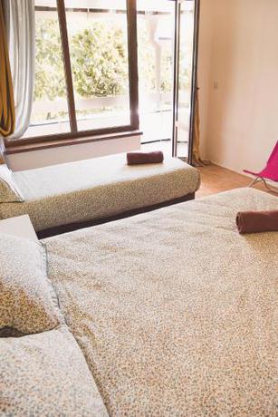 Imagen de la habitación del AMADINA GARDEN. Foto 18