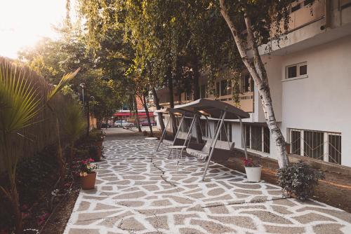 Imagen de la habitación del AMADINA GARDEN. Foto 20