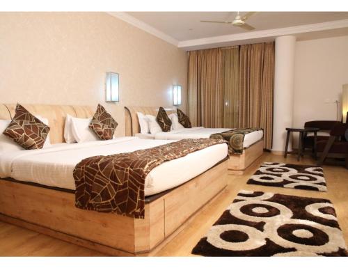Imagen de la habitación del AMR Hotel, Katra. Foto 19