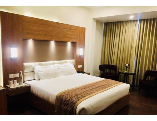 Imagen de la habitación del AMR Hotel, Katra. Foto 20