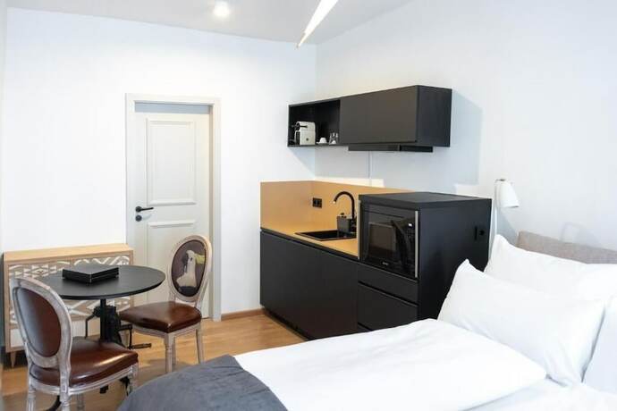 Imagen de la habitación del ANA Living Augsburg City Center. Foto 19