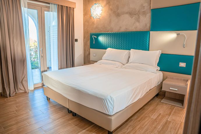 Imagen de la habitación del AQUA SARDINIA Boutique Hotel. Foto 17