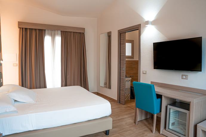 Imagen de la habitación del AQUA SARDINIA Boutique Hotel. Foto 19