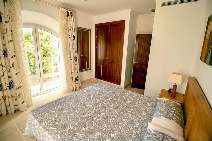 Imagen de la habitación del ARCOS GARDENS Villas y Adosados. Foto 9