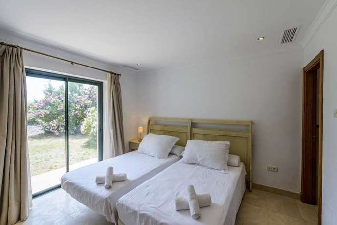 Imagen de la habitación del ARCOS GARDENS Villas y Adosados. Foto 10