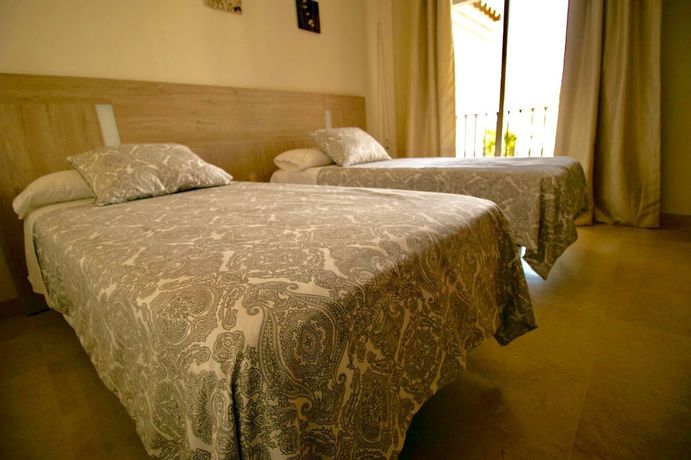 Imagen de la habitación del ARCOS GARDENS Villas y Adosados. Foto 19