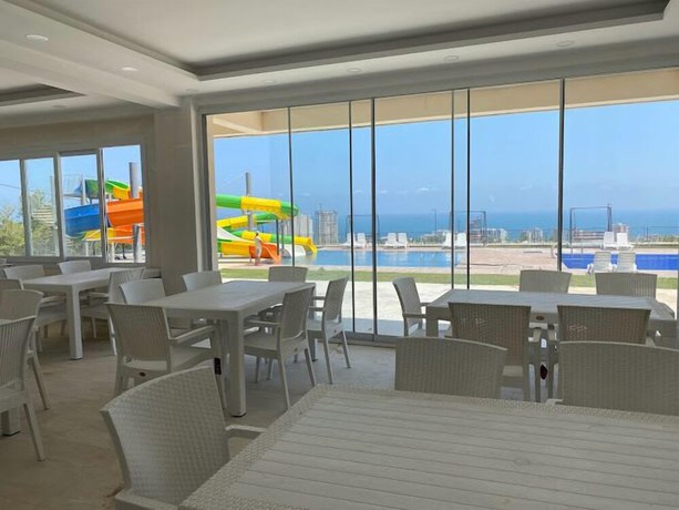 Imagen del bar/restaurante del ASİA TATİL K&Ouml;Y&Uuml;. Foto 5
