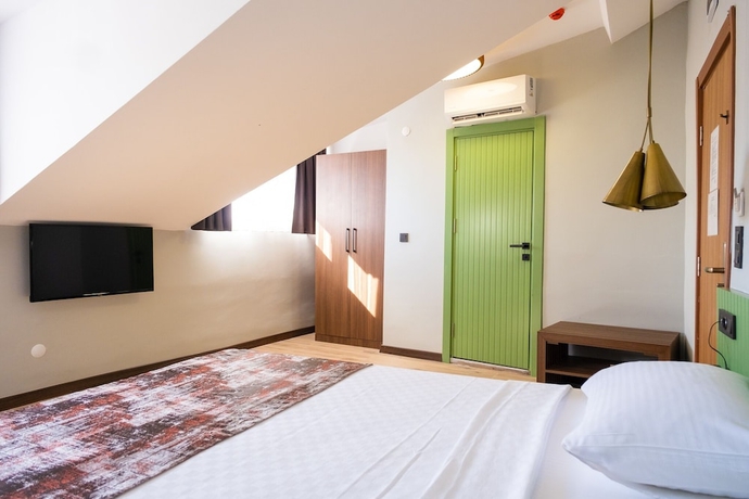 Imagen de la habitación del ASSOS TROY BEACH HOTEL. Foto 3