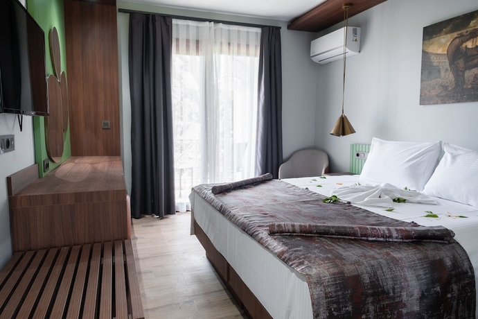 Imagen de la habitación del ASSOS TROY BEACH HOTEL. Foto 6