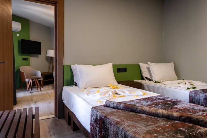 Imagen de la habitación del ASSOS TROY BEACH HOTEL. Foto 10