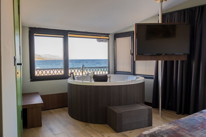 Imagen de la habitación del ASSOS TROY BEACH HOTEL. Foto 15