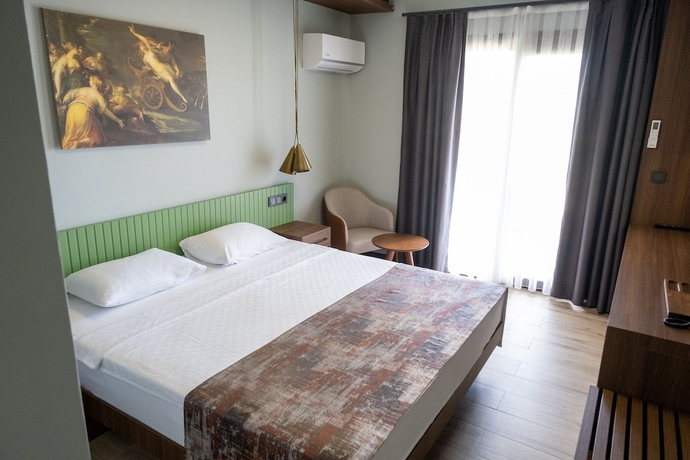 Imagen de la habitación del ASSOS TROY BEACH HOTEL. Foto 16