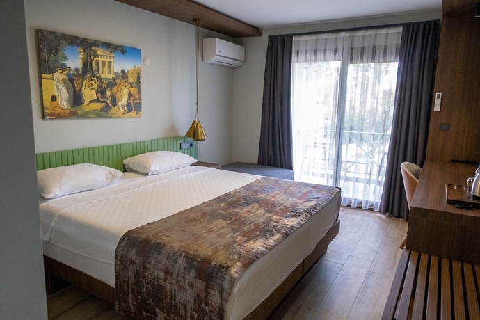 Imagen de la habitación del ASSOS TROY BEACH HOTEL. Foto 17