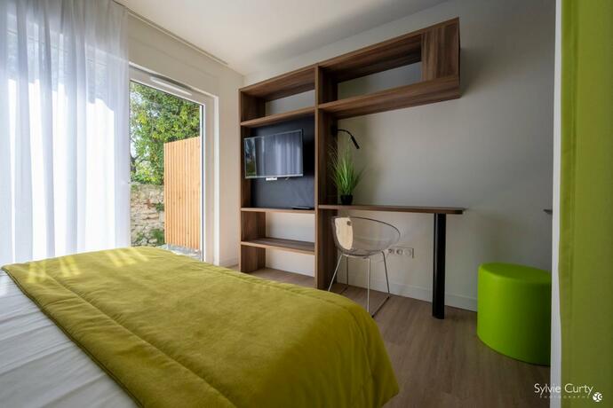 Imagen general del ATHOME RESIDENCE ET SPA. Foto 17