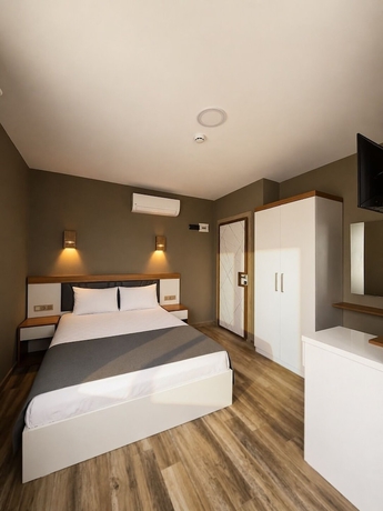 Imagen de la habitación del AURORA SIĞACIK HOTEL. Foto 2