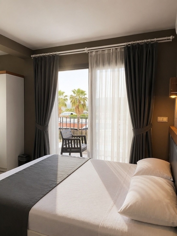 Imagen de la habitación del AURORA SIĞACIK HOTEL. Foto 3