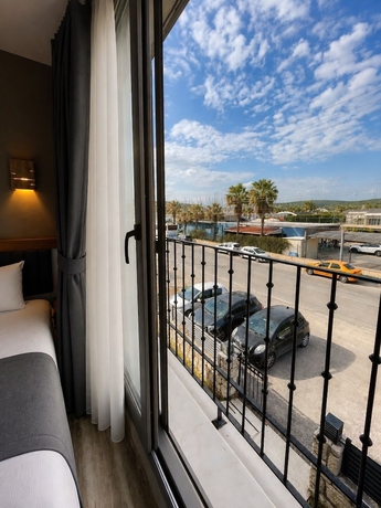Imagen de la habitación del AURORA SIĞACIK HOTEL. Foto 9