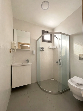Imagen de la habitación del AURORA SIĞACIK HOTEL. Foto 16