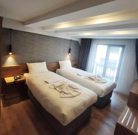 Imagen de la habitación del AZAD HOMES UNKAPANI. Foto 1