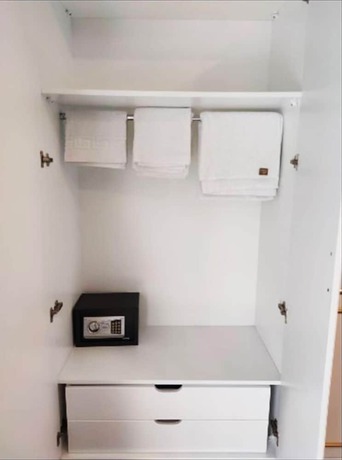Imagen de la habitación del AZAD HOMES UNKAPANI. Foto 4