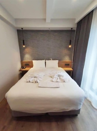 Imagen de la habitación del AZAD HOMES UNKAPANI. Foto 5