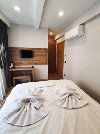 Imagen de la habitación del AZAD HOMES UNKAPANI. Foto 6