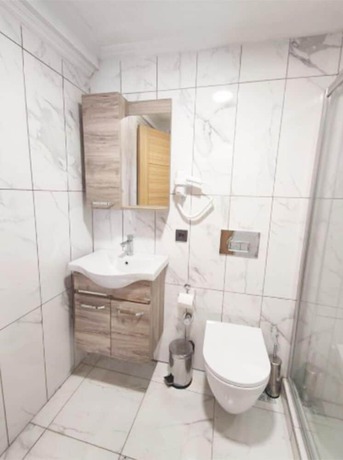 Imagen de la habitación del AZAD HOMES UNKAPANI. Foto 8