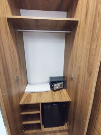 Imagen de la habitación del AZAD HOMES UNKAPANI. Foto 9