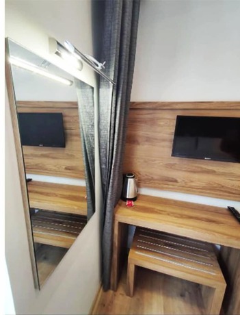 Imagen de la habitación del AZAD HOMES UNKAPANI. Foto 11