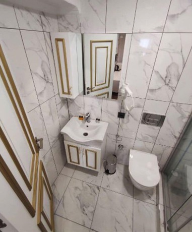 Imagen de la habitación del AZAD HOMES UNKAPANI. Foto 15