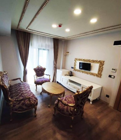 Imagen de la habitación del AZAD HOMES UNKAPANI. Foto 16