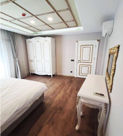 Imagen de la habitación del AZAD HOMES UNKAPANI. Foto 17