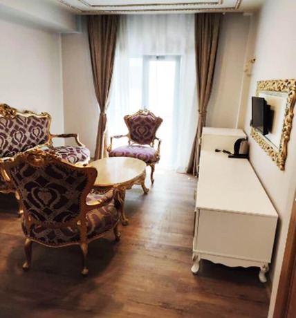 Imagen de la habitación del AZAD HOMES UNKAPANI. Foto 18