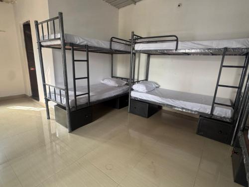 Imagen de la habitación del Aaroha Hilltop Backpackers Hostel. Foto 19