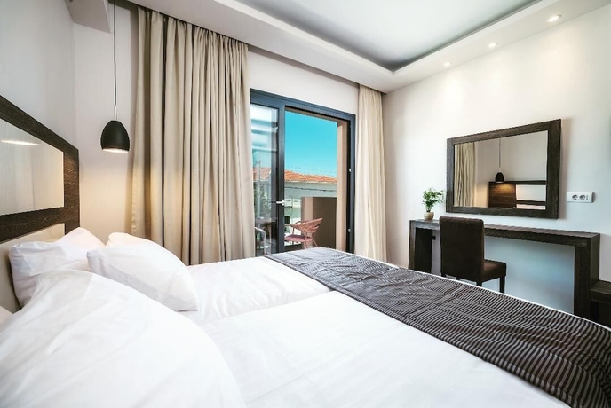 Imagen de la habitación del Abaton Luxury Resort. Foto 2