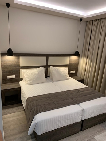 Imagen de la habitación del Abaton Luxury Resort. Foto 11