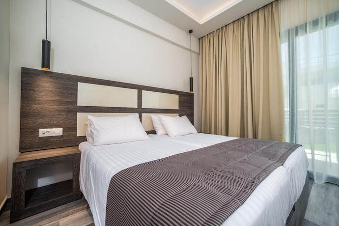 Imagen de la habitación del Abaton Luxury Resort. Foto 12