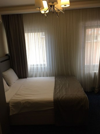 Imagen de la habitación del Acar Suite Hotel. Foto 6