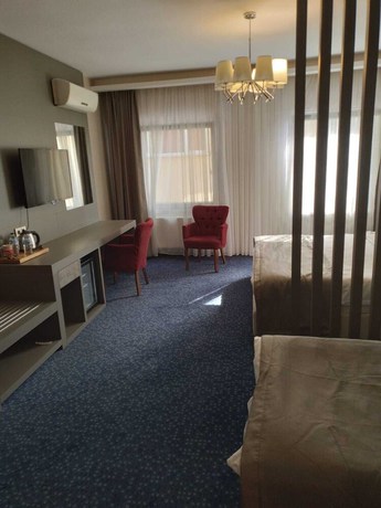 Imagen de la habitación del Acar Suite Hotel. Foto 8