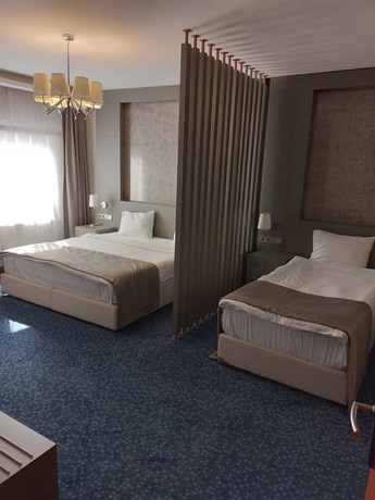 Imagen de la habitación del Acar Suite Hotel. Foto 11